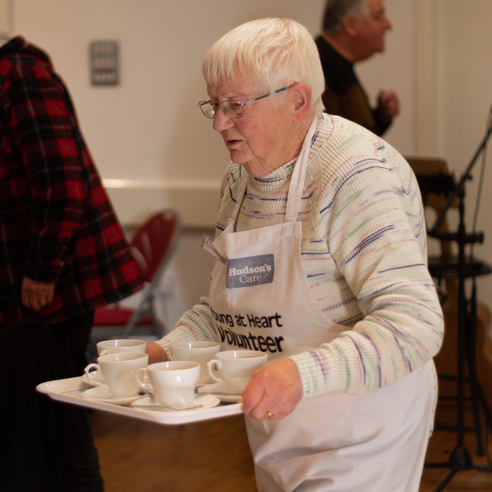 Volunteer - lady with tea